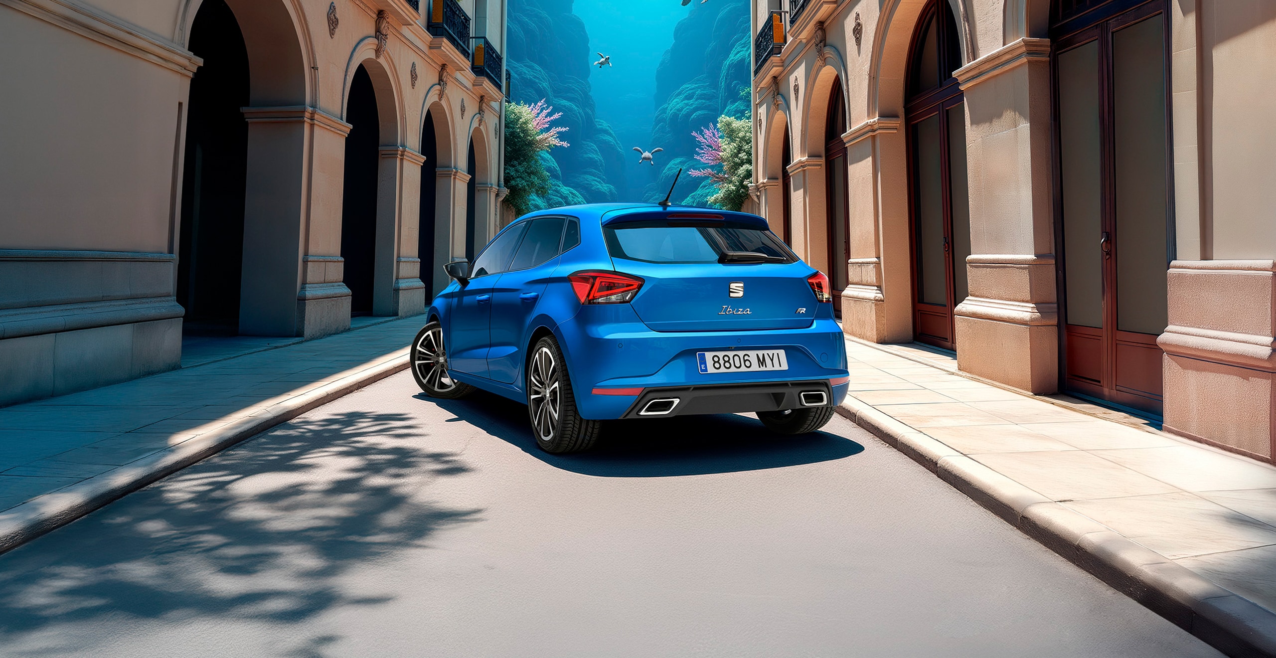 A blue SEAT Ibiza parked on a narrow street lined with tall buildings featuring arched doorways and balconies. The scene is styled with an underwater theme, showing marine life like turtles and fish swimming above the car, creating the illusion of a submerged urban setting. 