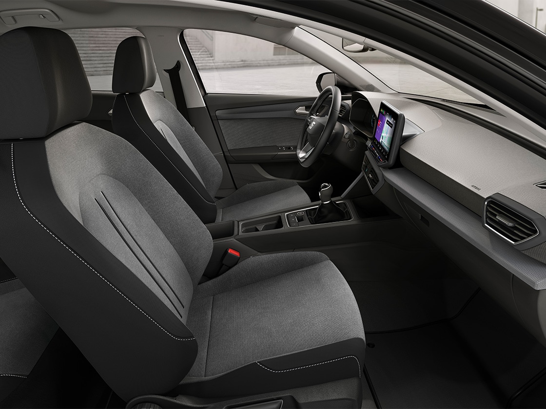 Interior view of seat leon sportstourer se featuring cloth comfort seats, offering a relaxed and practical driving. experience.