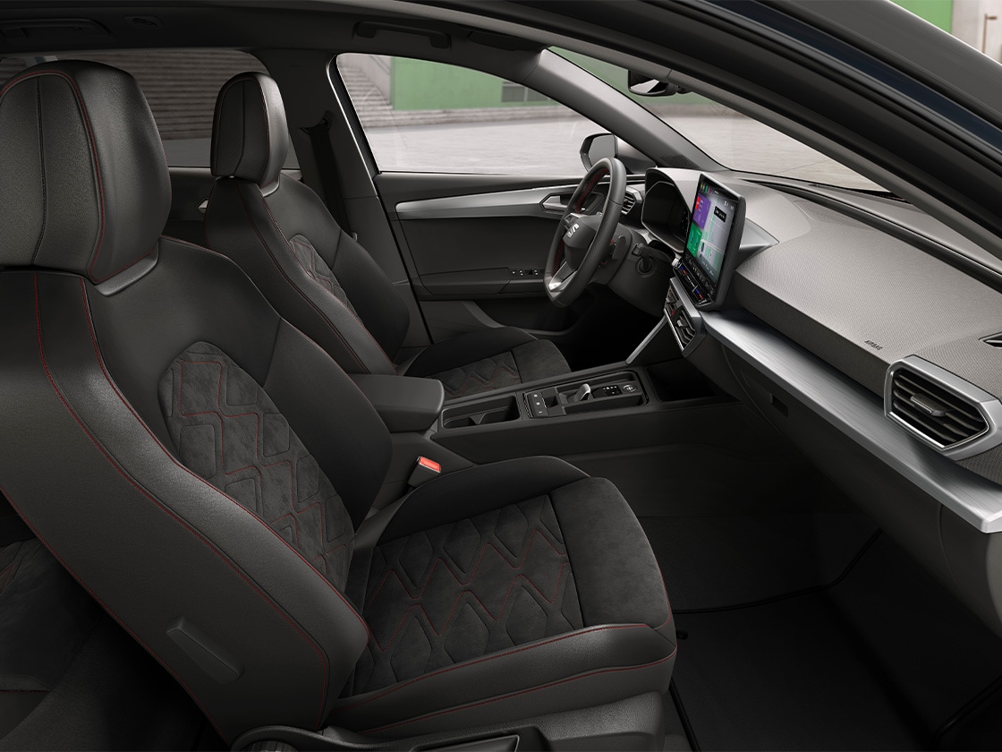 Interior view of seat leon sportstourer fr featuring FR cloth comfort seats, combining ergonomic support and stylish design for a comfortable journey.