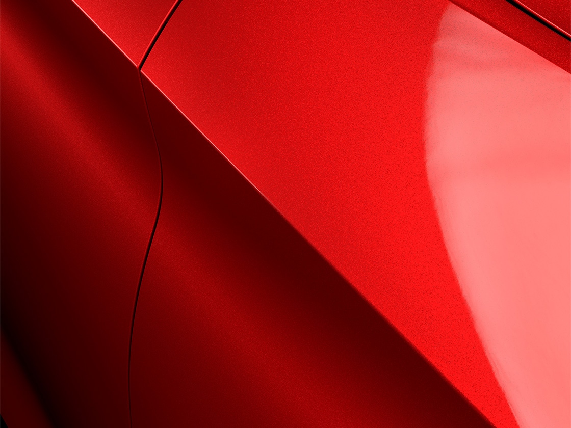 Seat leon sportstourer fr desire red with a special metallic finish, close up.