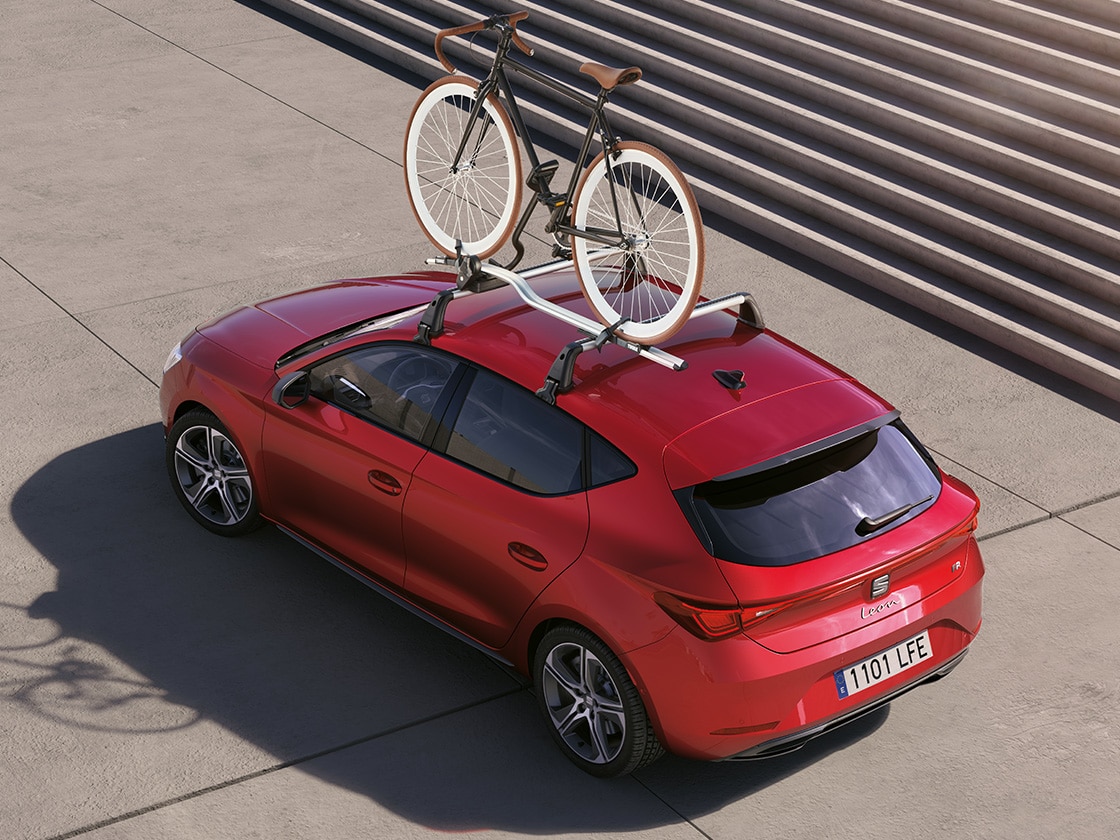 Red seat leon equipped with a bike rack, perfect for carrying your 2-wheel ride and exploring new adventures. Ideal for five door models in the range.