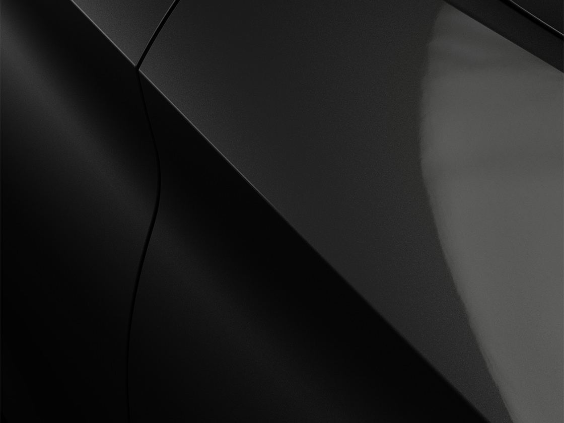 Seat leon sportstourer se in midnight black with a metallic finish, close up.