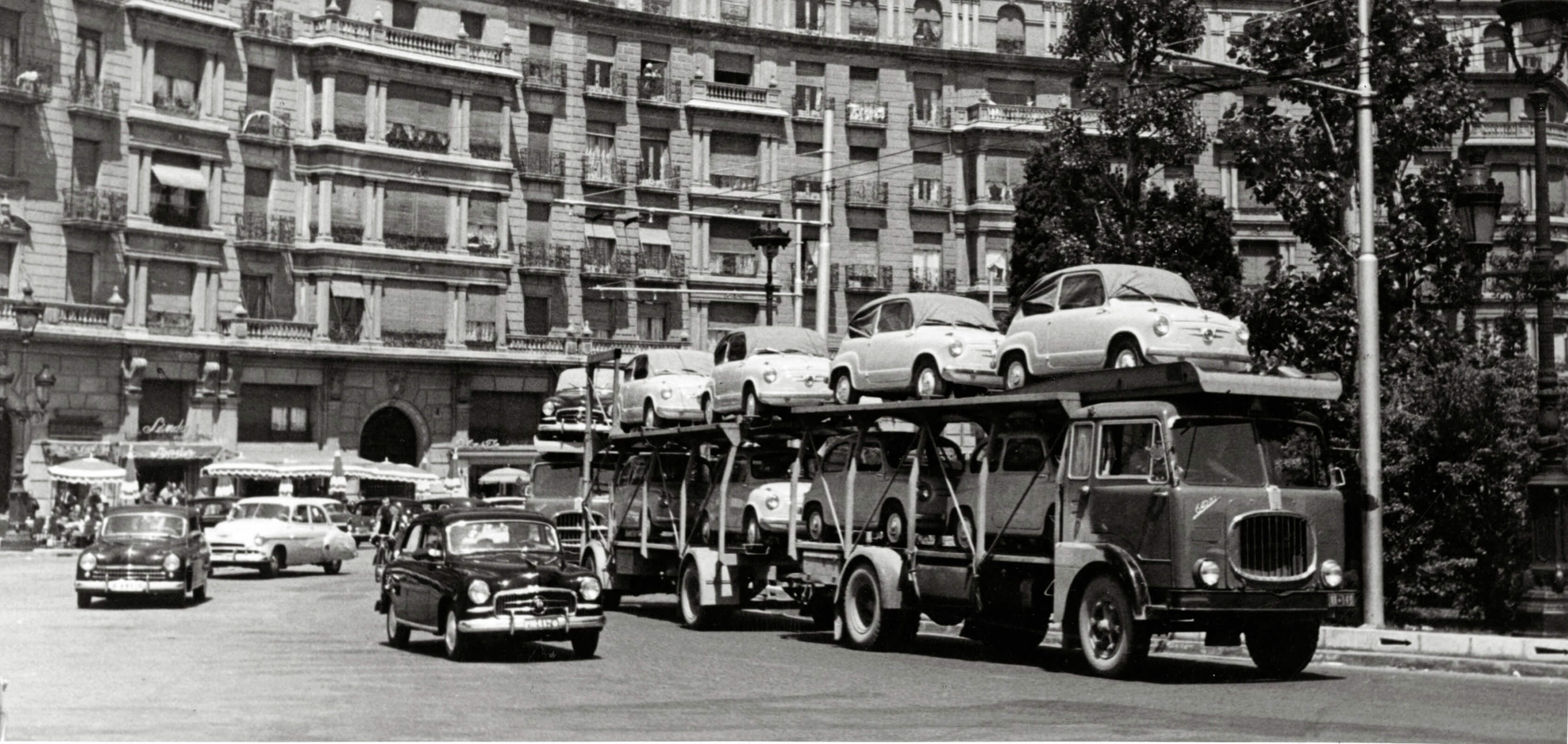 Vintage Classic SEAT 600 displayed on a truck