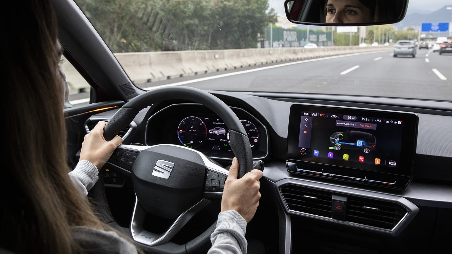 Woman driving the new SEAT Leon hybrid