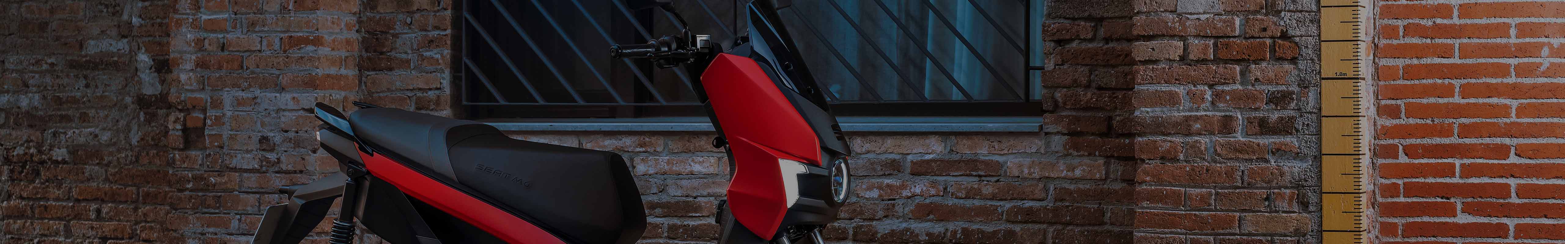 SEAT Mo electric scooter side view in red and black urban mobility