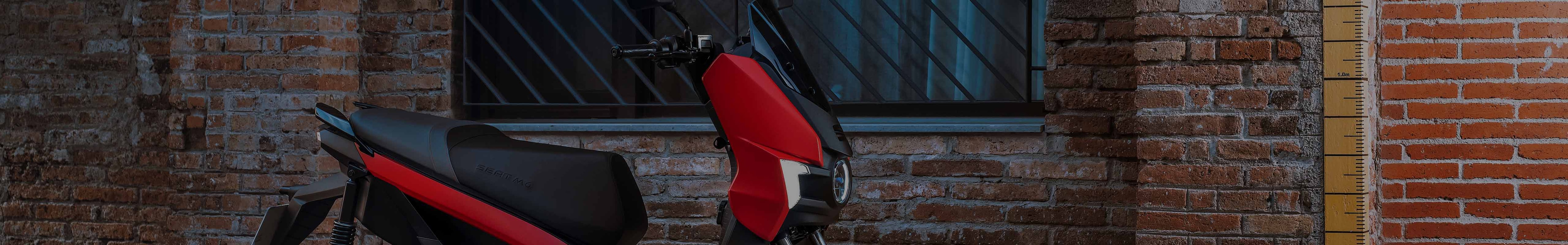 SEAT Mo electric scooter side view in red and black urban mobility