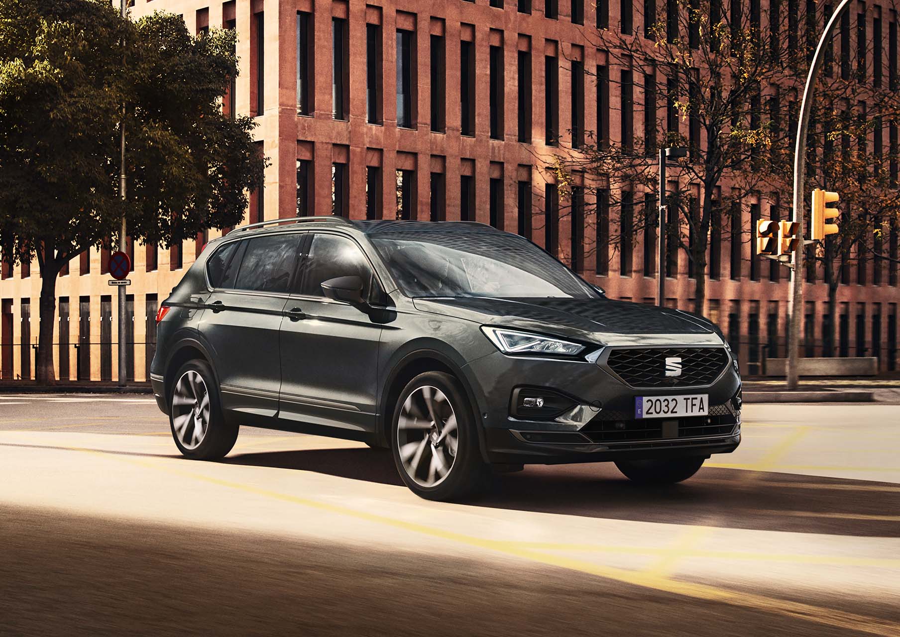 Grey SEAT Tarraco with alloy wheels driving